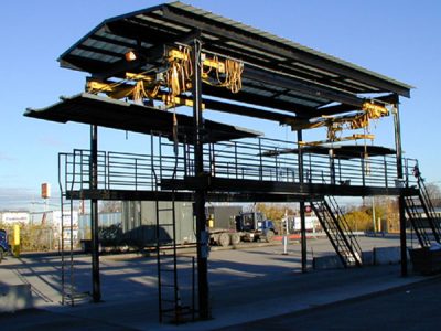 Free standing, outdoor crane system with under running bridge crane